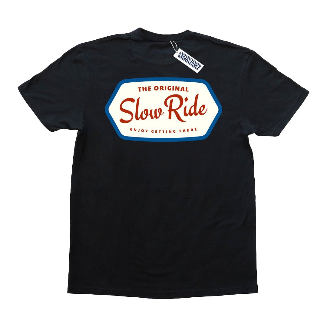 Enjoy Freedom Tee (Black) - Slow Ride Classic Slow Ride t-shirt available in black and white, featuring a vintage-inspired patch design with 'The Original Slow Ride' text. Perfect for fans of Off-Roading and Off-Road Racing, this slow ride shirt celebrates the iconic Volkswagen culture, including the Volkswagen bus, Volkswagen bug, and Baja bug. Ideal for anyone who loves the laid-back, adventurous spirit of vintage Volkswagen vehicles